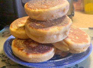 einkorn english muffins on a blue willow plate